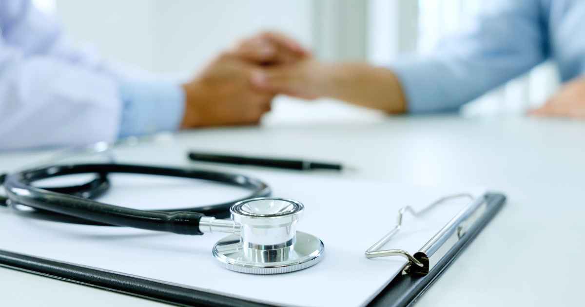 Physician preparing for bone marrow aspirate concentrate (BMAC) for regenerative joint treatment